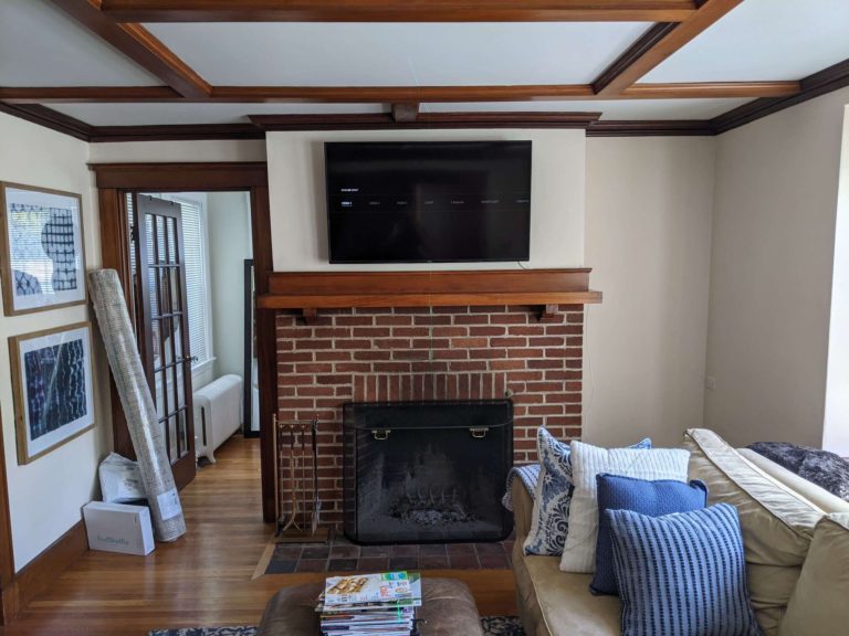 Above a fireplace tv mounting installation.