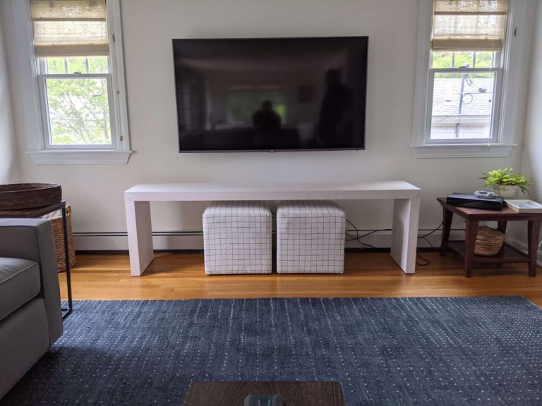 TV mounting with wires hidden behind the wall.