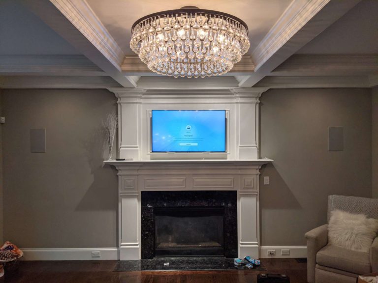 TV mounting above a fireplace.